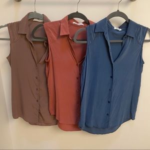 Three Everlane silk shirts